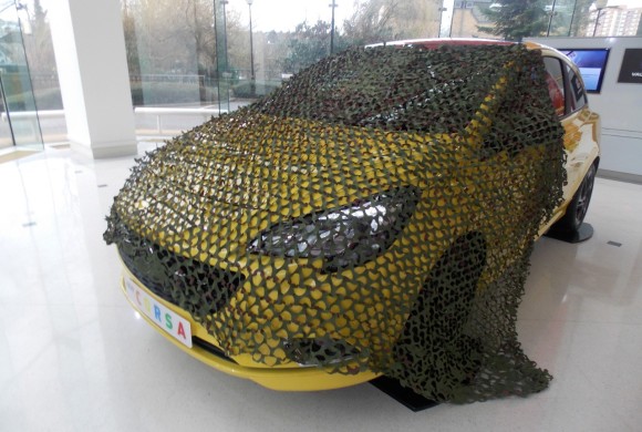 CAMOUFLAGE NET FOR THE CORSA ‘D IS FOR DISAPPEAR’